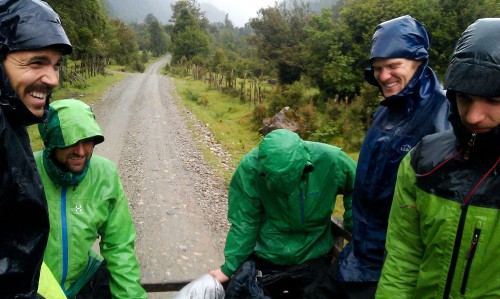 A bunch of wet climbers on a truck, back to civilization